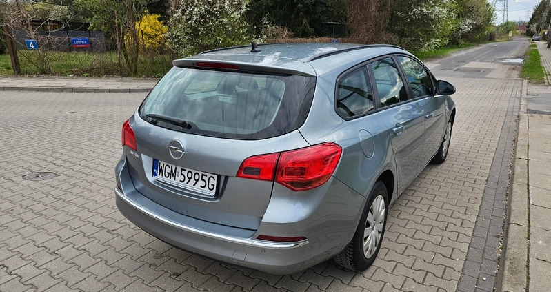 Opel Astra cena 19900 przebieg: 241000, rok produkcji 2013 z Libiąż małe 704